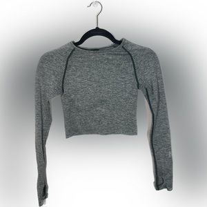 Green workout 2 piece set by PINK. Long sleeve to with thumb holes/contour pants